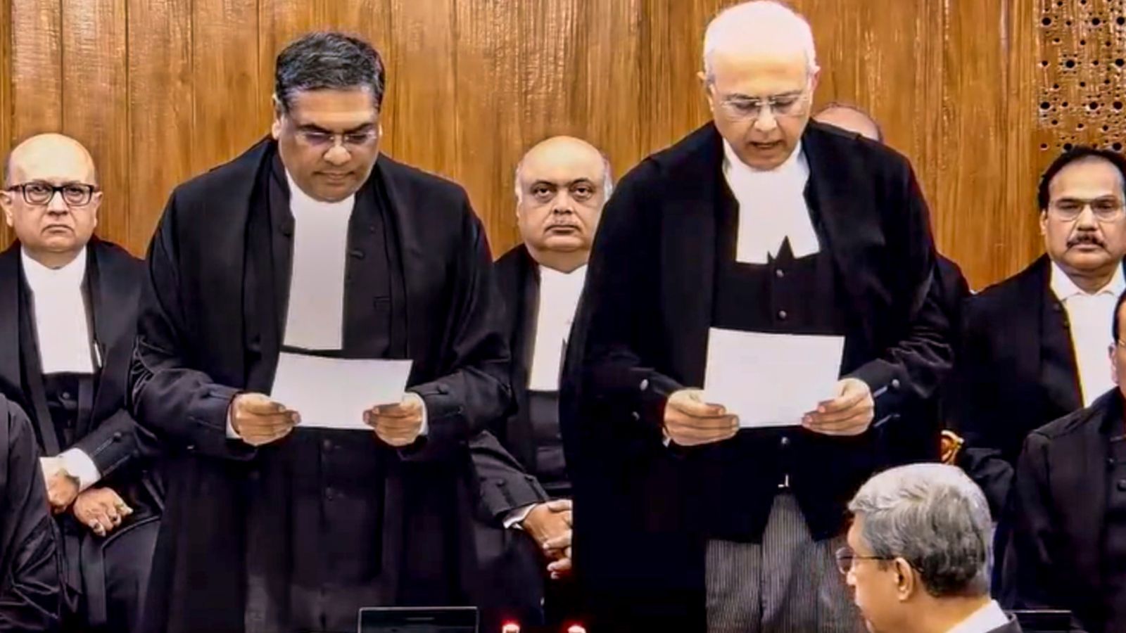 Chief Justice of India Sanjiv Khanna administers the oath of office to Justice Manmohan as a judge of the Supreme Court, in New Delhi