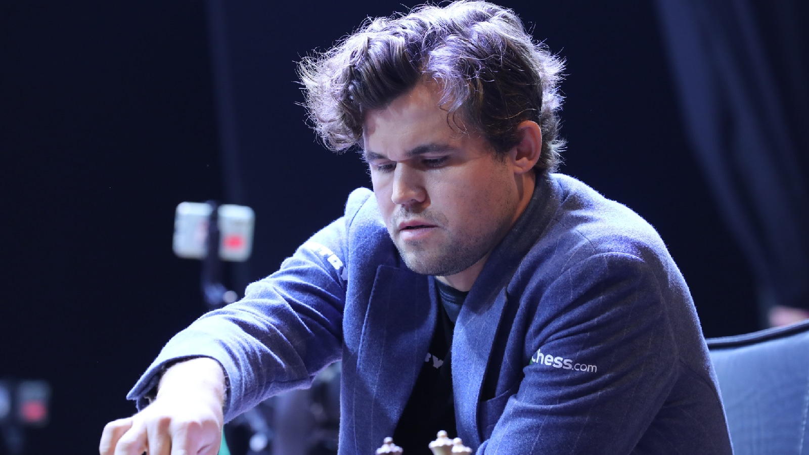 Magnus Carlsen during a FIDE chess match at the Tata Steel Chess India Rapid and Blitz at the Dhono Dhonyo Auditorium in Kolkata. (Express photo by Partha Paul)