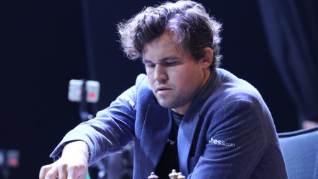 Magnus Carlsen during a FIDE chess match at the Tata Steel Chess India Rapid and Blitz at the Dhono Dhonyo Auditorium in Kolkata. (Express photo by Partha Paul)