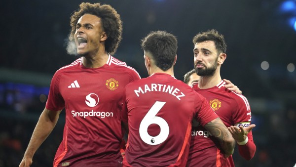 Manchester United players celebrate after Bruno Fernandes, right, scored his side's first goal during the English Premier League match at the Etihad Stadium. (AP Photo)