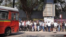 electric bus Commuters wait to catch Best bus to their destination at Andheri. (Express File Photo)