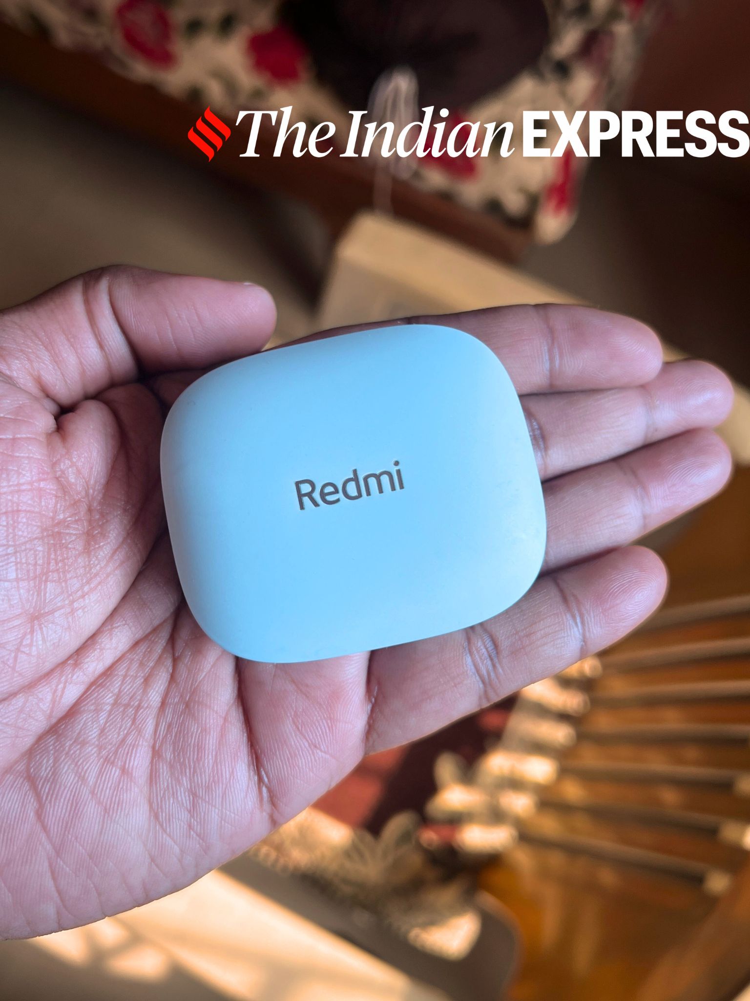 The Redmi Buds 6 in the cool Ivy green shade