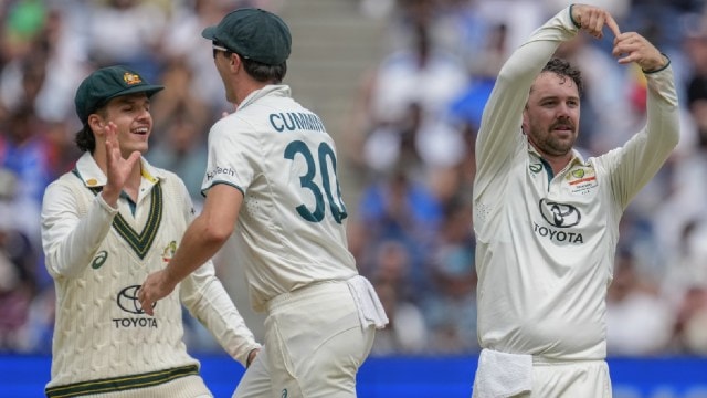 Australia's captain Pat Cummins, (center), Travis Head, (left), and Sam Konstas celebrates the wicket of India's Rishabh Pant during play on the last day of the fourth cricket test between Australia and India at the Melbourne Cricket Ground, Melbourne, Australia. (AP)