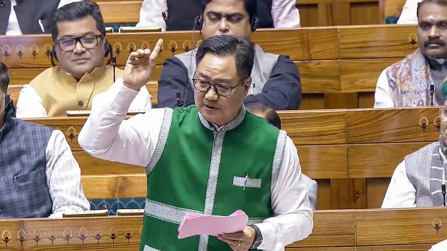 Union Minister for Parliamentary Affairs and Minority Affairs Kiren Rijiju speaks in the Lok Sabha during the Winter session of Parliament, in New Delhi