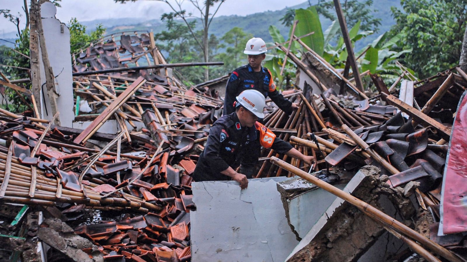 Landslides and flash floods hit Indonesia’s Java island, leaving 10 ...