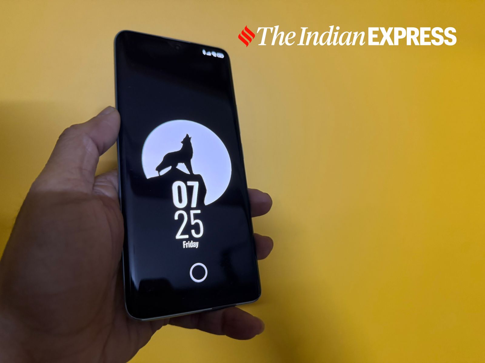 The Redmi Note 14 Pro+ 5G lock screen showcases its vibrant AMOLED display with a sleek wolf-themed wallpaper, blending style and functionality. (Image: Nandagopal Rajan/The Indian Express)