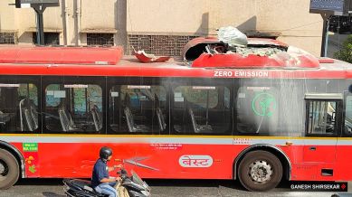 A BEST bus caught fire near Nagpada in Byculla on Tuesday. (Express Photo by Ganesh Shirsekar)