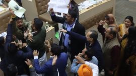 BJP and Congress councillors push each other during Chandigarh MC house meeting on Tuesday.