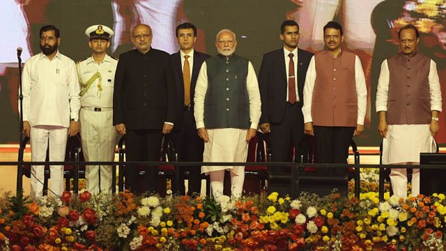 Prime Minister Narendra Modi, Maharashtra Governor CP Radhakrishnan, BJP leader Devendra Fadnavis and NCP (Ajit faction) leader Ajit Pawar during the swearing-in ceremony, in Mumbai. (Express Express Photo by Narendra Vaskar)