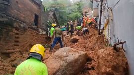 Rescue work underway after a lanslide following heavy rainfall, in Tiruvannamalai, Tamil Nadu