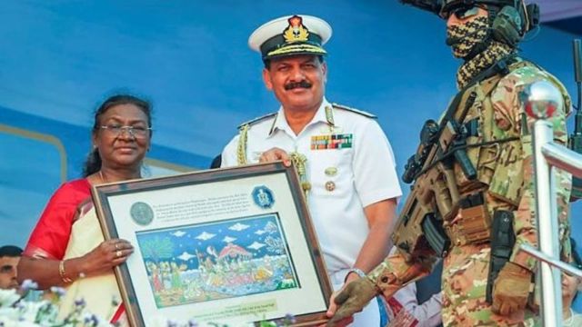 President Droupadi Murmu with Chief of Naval Staff Admiral Dinesh K Tripathi during the Navy Day celebrations wherever  the Naval unit   carried retired  operational demonstration, successful  Puri connected  Wednesday, (Photo PTI)