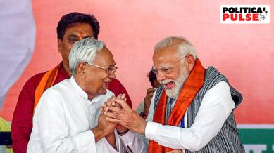 Prime Minister Narendra Modi with Bihar Chief Minister Nitish Kumar during a public meeting for Lok Sabha polls, in Munger,