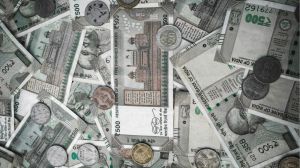 Rupee hits record closing low, forward premiums extend decline