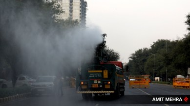 An anti-smog gun sprinkling water to control pollution in Delhi. (Express file photo by Amit Mehra)