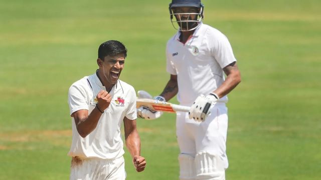 Mumbai player Tanush Kotian celebrates the wicket.