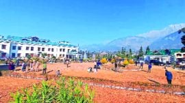The Vidhan Sabha complex of Himachal Pradesh in the foothills of Dhauladhar range at picturesque Tapovan. (Express Photo by Saurabh Parashar)