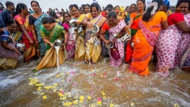 In India, people came together in Chennai to offer flowers and milk into the sea to propitate the gods and offer prayers to those lost in the 2004 Tsunami disaster.