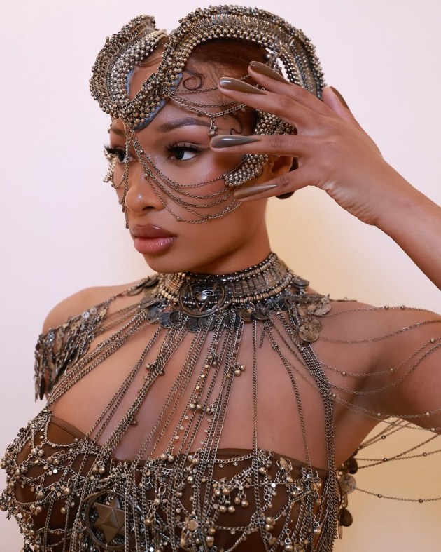 The collection took centre stage with American rapper Megan Thee Stallion, who made a striking entrance in a drape chain gown from the line. (Source: Megan Thee Stallion/Instagram)