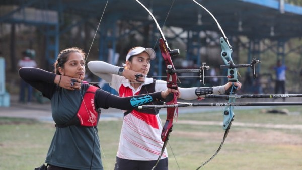 Two archers in action at the Army Sports Institute in Pune’s Koregaon Park (Express photo by Arul Horizon)