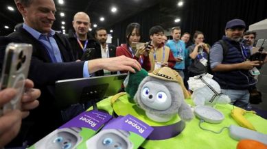 People look at Ropets, AI robot pets, during CES Unveiled at CES 2025, an annual consumer electronics trade show, in Las Vegas. (Image: REUTERS/Steve Marcus)