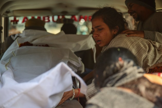 Saumya Srivastava cries inside an ambulance after receiving the body of her mother, Neelam, who died in a stampede at Maha Kumbh Mela on Mauni Amavasya in Prayagraj on January 29, 2025. (Express photo by Chitral Khambhati 290125), maha kumbh stampede