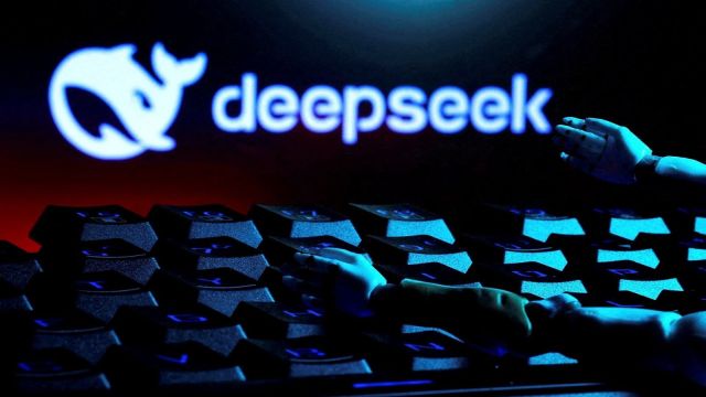 The deepseek logo, a keyboard, and robot hands are seen in this illustration taken January 27, 2025. (REUTERS/Dado Ruvic/Illustration)