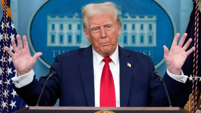 US President Donald Trump addresses reporters at the White House on Thursday.