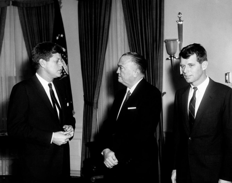 Hoover meeting with President John F. Kennedy and Attorney General Robert F. Kennedy in the Oval Office at White House. (JFK Presidential Library)