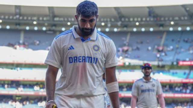 India's Jasprit Bumrah walk off the field on the end of the day four of the fourth cricket test between Australia and India at the Melbourne Cricket Ground, Melbourne, Australia, Sunday, Dec. 29, 2024. (AP Photo)