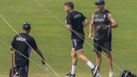 England captain Jos Buttler (center) runs during their practice session ahead of their first Twenty20 cricket match against India, in Kolkata on Tuesday. (AP Photo)