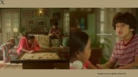 The ad opens with a young boy and his mother sitting together on a couch (Image source: @pbhushan1/X)