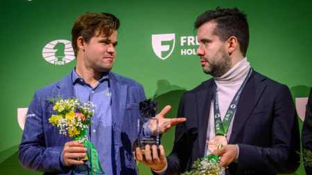 Magnus Carlsen and Ian Nepomniachtchi share the World Blitz Championship title. (PHOTO: Michael Walusza/FIDE)