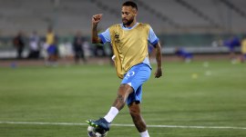 Al Hilal's Neymar shoots the ball during warm up for the AFC Champions League match against Iran's Nassaji at the Azadi Stadium in Tehran, Iran, Oct. 3, 2023. (AP Photo)