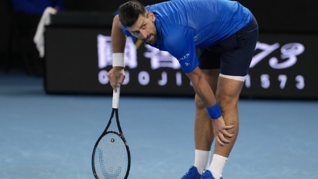 Novak Djokovic of Serbia reacts during his quarterfinal match against Carlos Alcaraz of Spain at the Australian Open tennis championship in Melbourne, Australia, Wednesday, Jan. 22, 2025. (AP Photo)