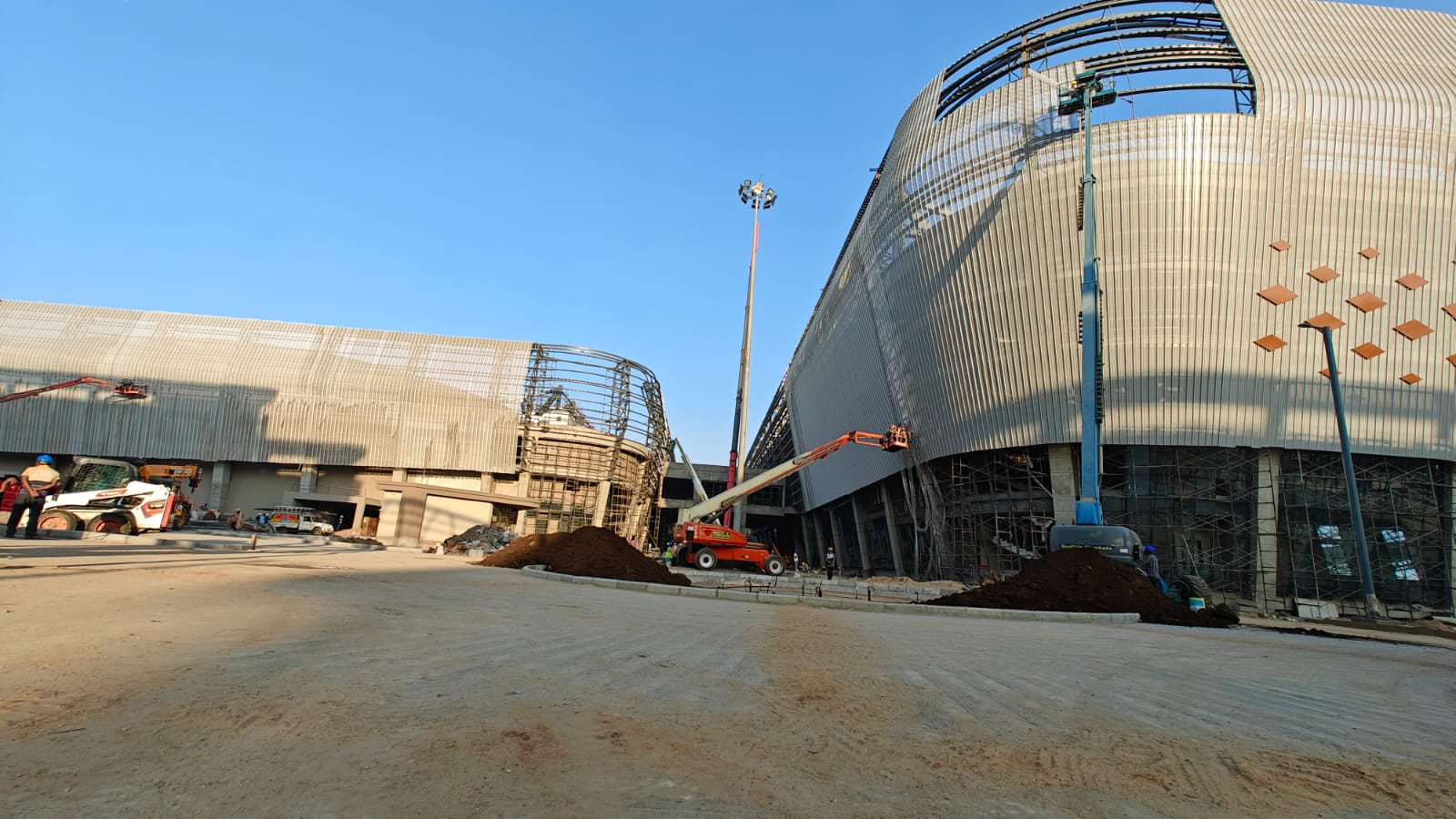 More than 1,000 labourers have been working on a war-footing to finish the complex since Ahmedabad threw its hat in the ring to host the 2036 Olympics. (EXPRESS PHOTO BY Mihir Vasavda)