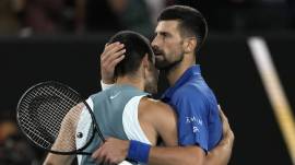 Novak Djokovic returned from a set down and a minor injury to defeat Carlos Alcaraz in the quarterfinal of the Australian Open on Tuesday. (AP)