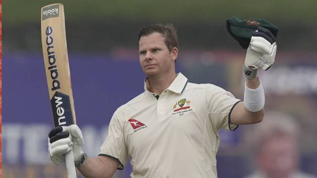 Steve Smith struck his 35th Test 100  aft  completing 10,000 runs successful  the format successful  Galle connected  Wednesday. (AP)