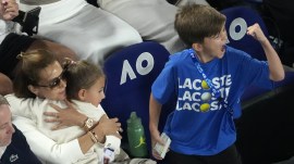 Novak Djokovic and Jelena's children Stefan and Tara watch his Australian Open quarter-final. (PHOTO: AP)