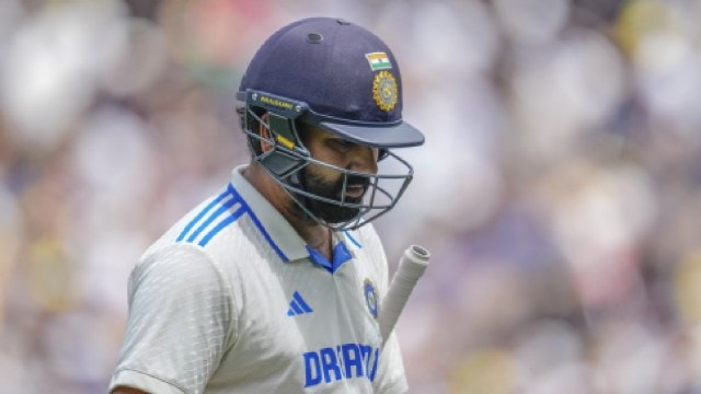 India's captain Rohit Sharma walks off the field after losing his wicket during play on the second day of the fourth cricket test between Australia and India at the Melbourne Cricket Ground, Melbourne, Australia, Friday, Dec. 27, 2024. (AP Photo)