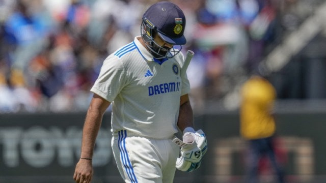 India's captain Rohit Sharma walks off the field after losing his wicket during play on the last day of the fourth cricket test between Australia and India at the Melbourne Cricket Ground, Melbourne, Australia, Monday, Dec. 30, 2024. (AP Photo)