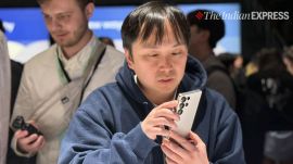 An attendee tries the new Galaxy S25 at an event in San Jose, California, on Wednesday. (Image credit: Anuj Bhatia/Indian Express)