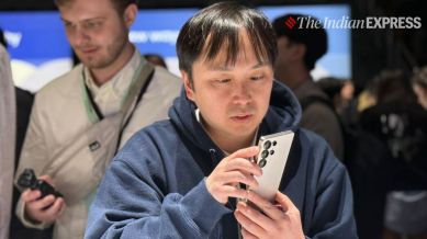 An attendee tries the new Galaxy S25 at an event in San Jose, California, on Wednesday. (Image credit: Anuj Bhatia/Indian Express)