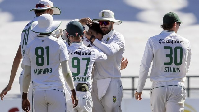 South Africa players celebrate the wicket of Pakistan's Salman Agha during the fourth day of the second test match between South Africa and Pakistan in Cape Town, South Africa. (AP)