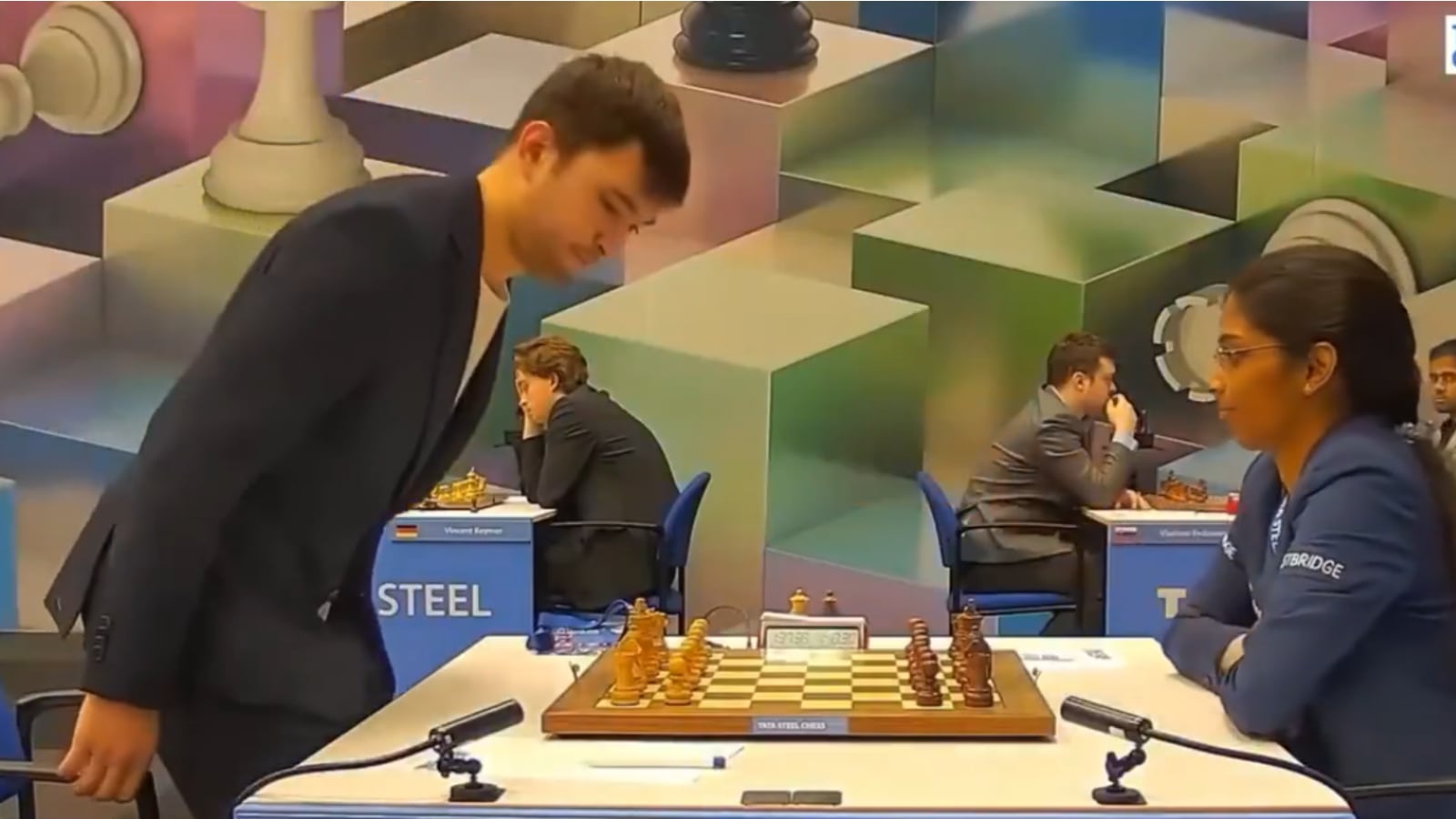 Vaishali Rameshbabu (right) and Uzbekistan grandmaster Nodirbek Yakubboev during their match in Tata Steel Chess Tournament.