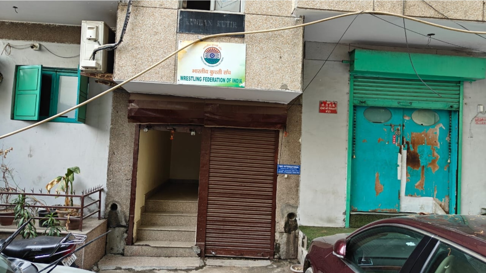 July, 2024: A WFI nameplate at the entrance to the building in Hari Nagar.