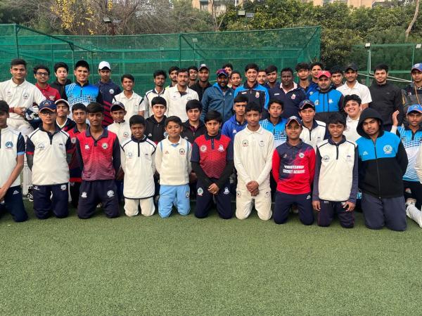 Rounak Waghela with other trainees at the Venkateshwar Cricket Academy in Dwarka. (Express Photo)