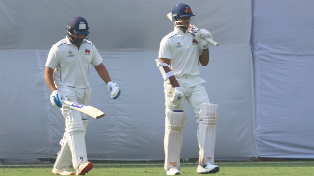 Yashasvi Jaiswal and Rohit Sharma walk out to bat for Mumbai in the Ranji Trophy game against Jammu and Kashmir. (Express Photo by Amit Chakravarty)