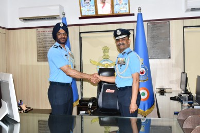 Air Commodore Ajit Singh Dham (left) receives the charge from Air Commodore AP Saraph. (Express Photo)