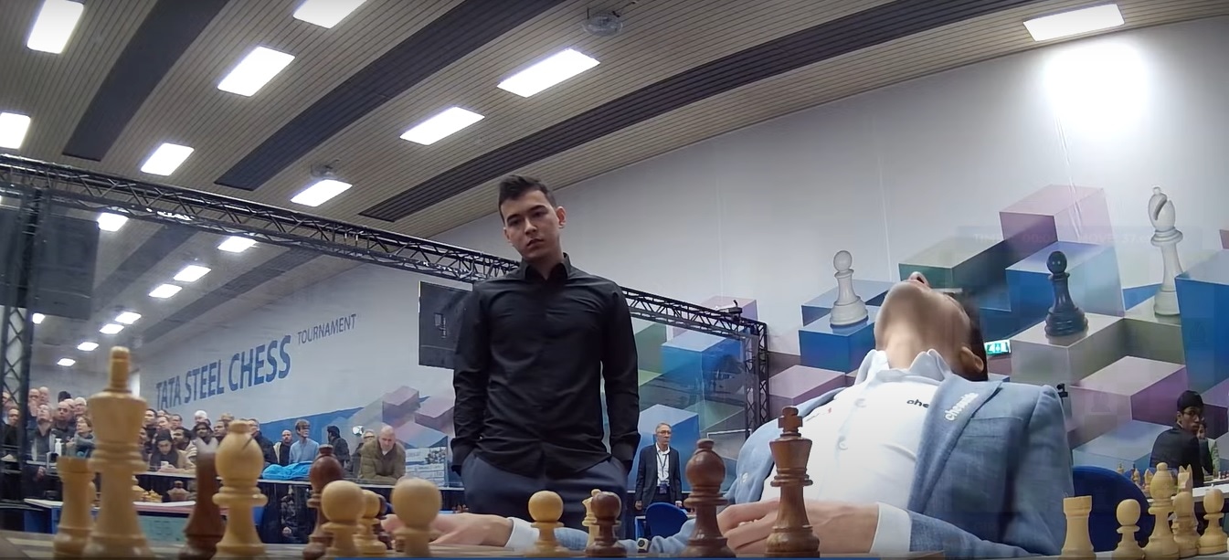 Anish Giri reacts after his error against Gukesh. (Screenshot: YouTube/Chess24)