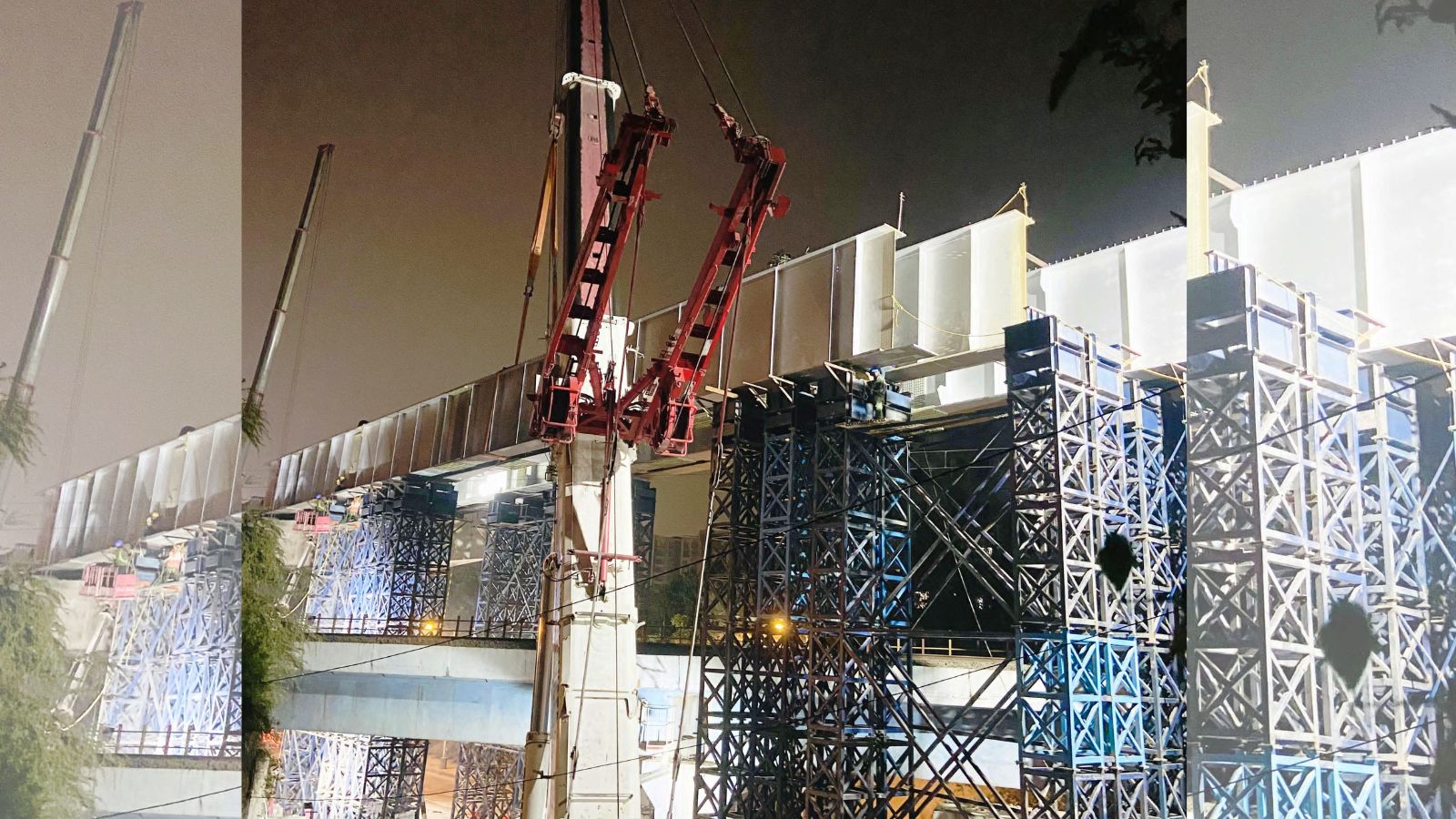 BMRCL erects composite steel girders over railway track near Rainbow Hospital BMRCL erects composite steel girders over railway track near Rainbow Hospital